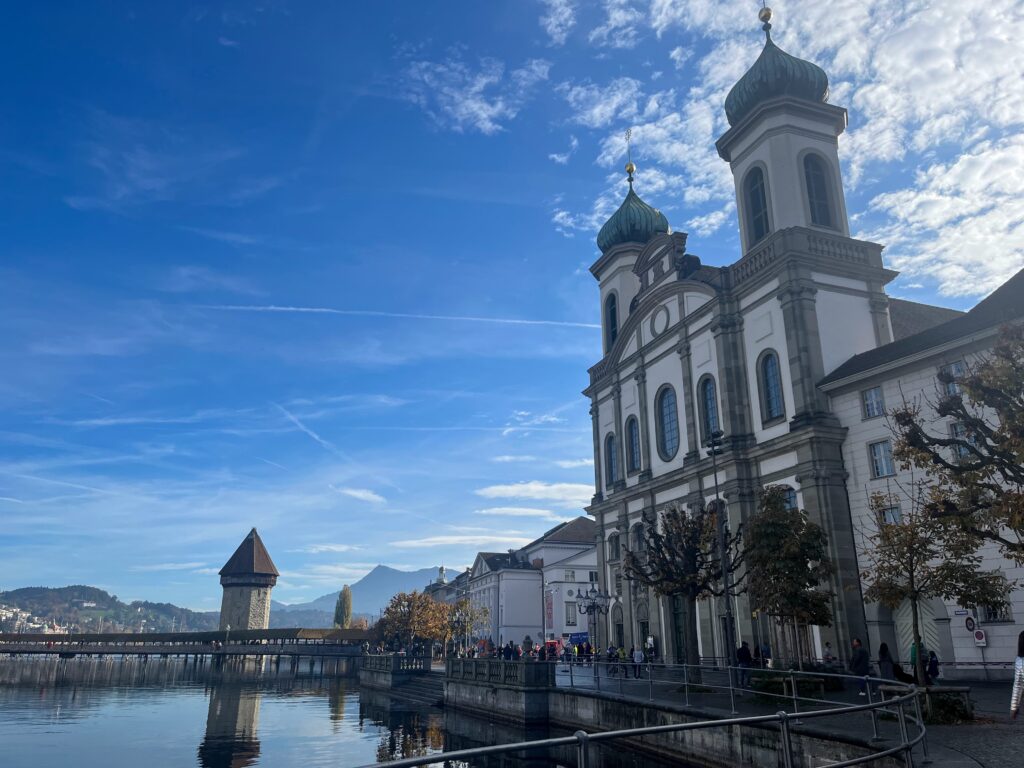 view of chapel bridge and jesuit church in lucerne