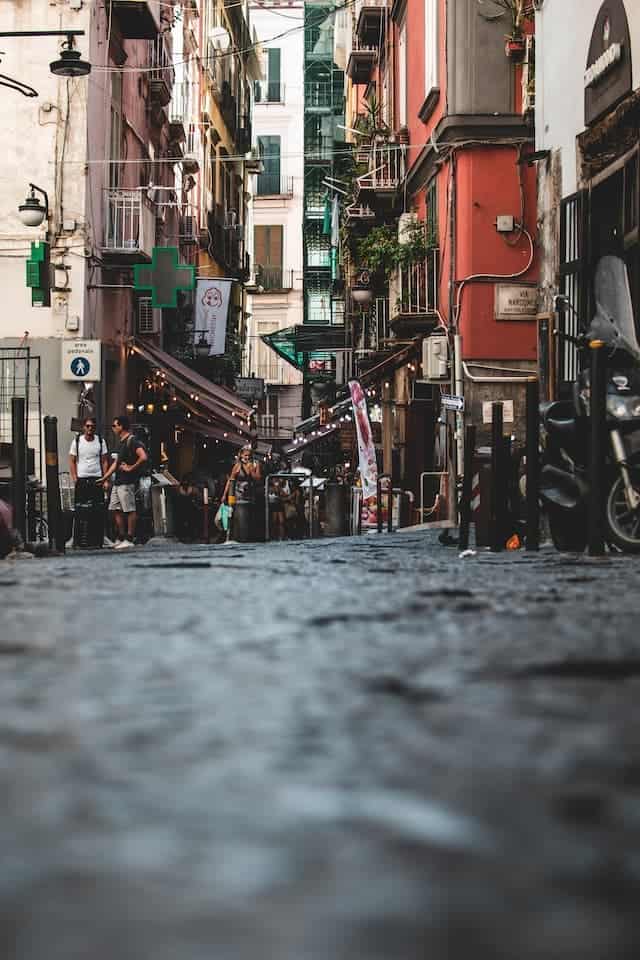view looking up at a crowded street in Naples