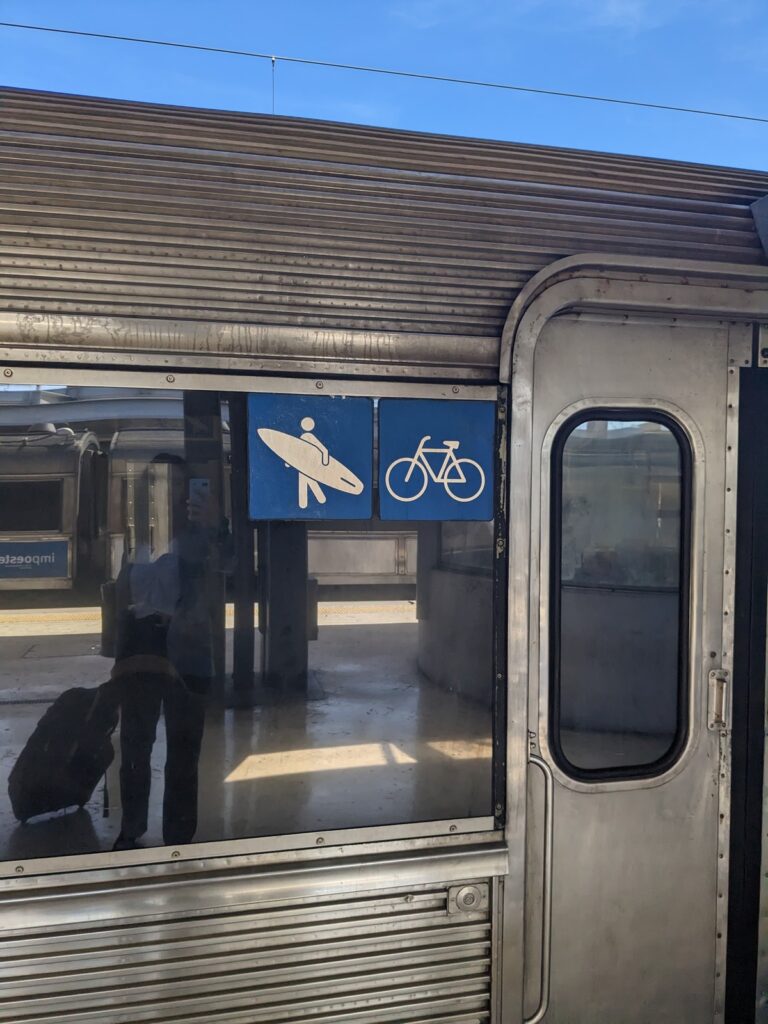 Trains from Lisbon showing surf boards signs 