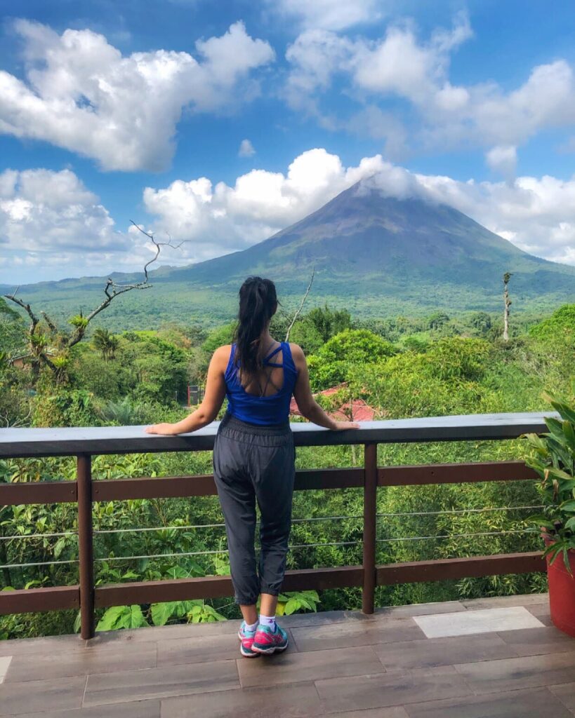 is traveling a hobby? Looking out at Arenal volcano in Costa Rica