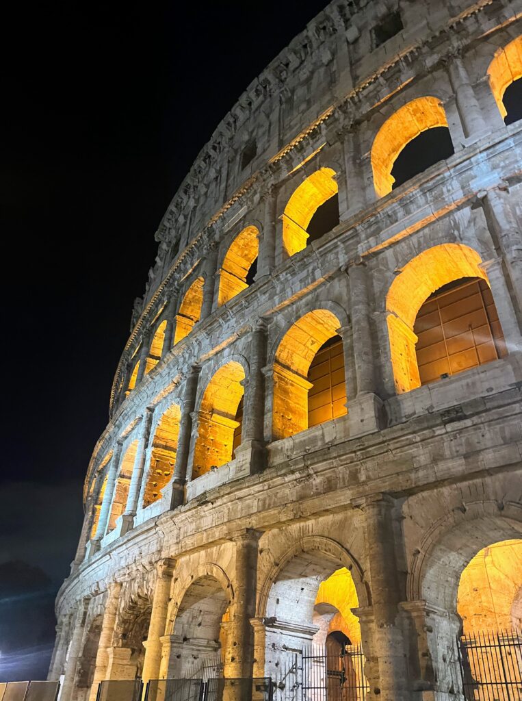 View of Colosseum at night lit up