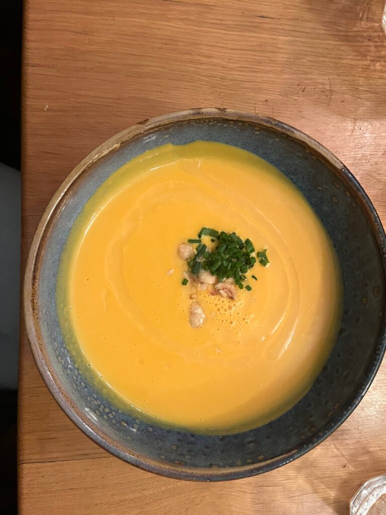 sweet potato soup enjoyed on a food tour in Paris